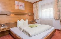 Piz Arina Apartments – Wohnung 2 – Schlafzimmer